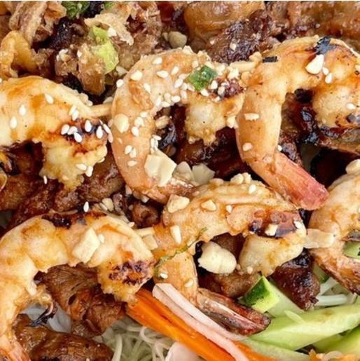 Grilled Prawns & Pork Slices + Rice - Marinated grilled prawns and pork served over jasmine rice with vegetables